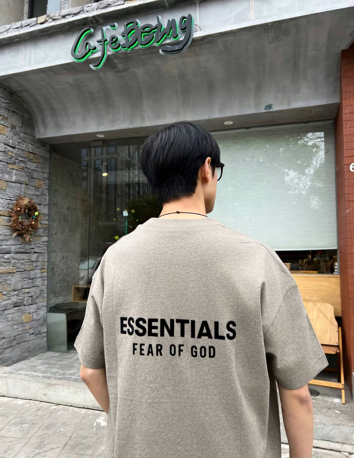 Back view of Essentials Fear of God Always On SS25 heather T-shirt logo print