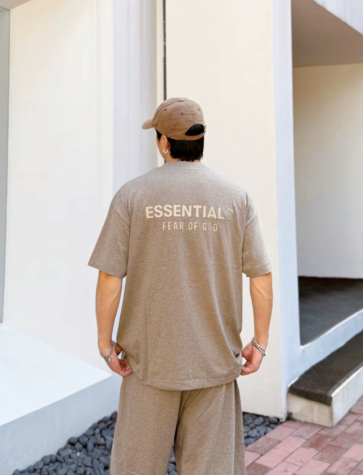 Back view of Essentials Fear of God SS25 Classic oversized tee with logo heather